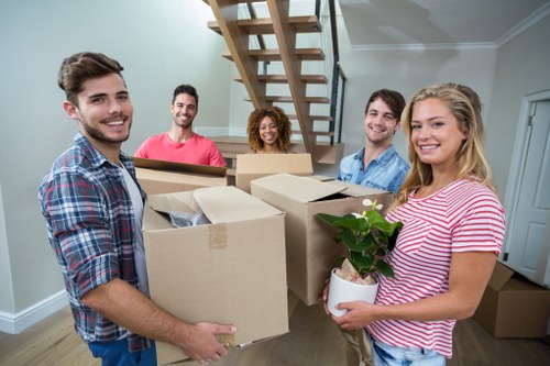 Furniture pick-up service expert handling items in Sutton