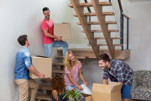 Customer receiving efficient furniture pick-up service in Sutton