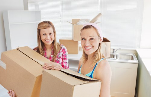 Loading furniture into a van by a Sutton provider
