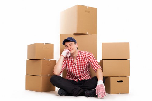 A planner and moving boxes representing home move planning in Sutton